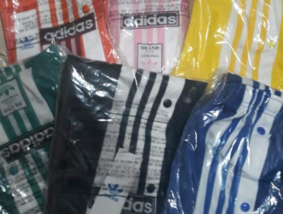 Pantalon de nena adidas con broches al costado