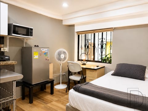 Apartaestudio cómodo y elegante cerca a Laureles, Coliving Malibu